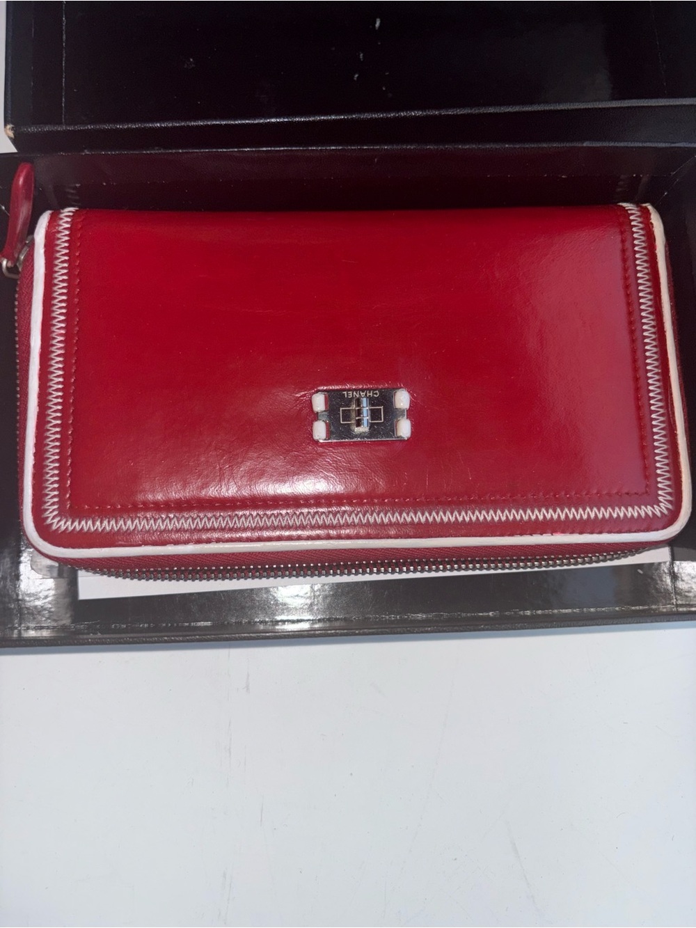 CHANEL Red Leather Zip-Around Wallet with White Trim